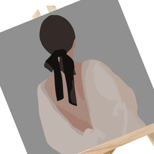 A paint-by-numbers kit image featuring a section of a woman's profile with a black ribbon in her hair, painted on a canvas with a wooden frame.