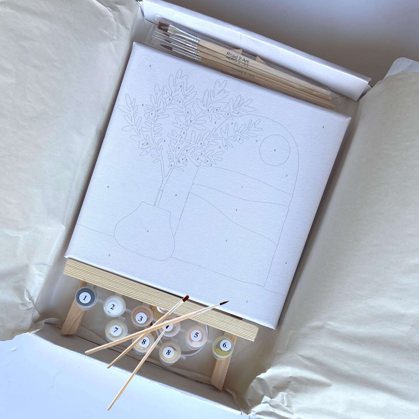 Framed paint by numbers artwork of olive tree in modern style