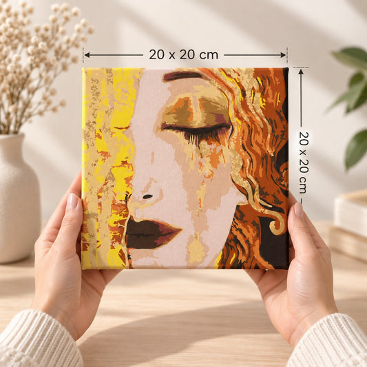 Golden Tears 20x20 cm square framed canvas size guide held in two hands