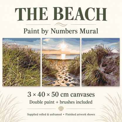 The Beach three-panel paint by numbers mural: dune grasses and a sandy path to the sunset. Three 40 x 50 cm rolled, unframed canvases, double paint and brushes included.