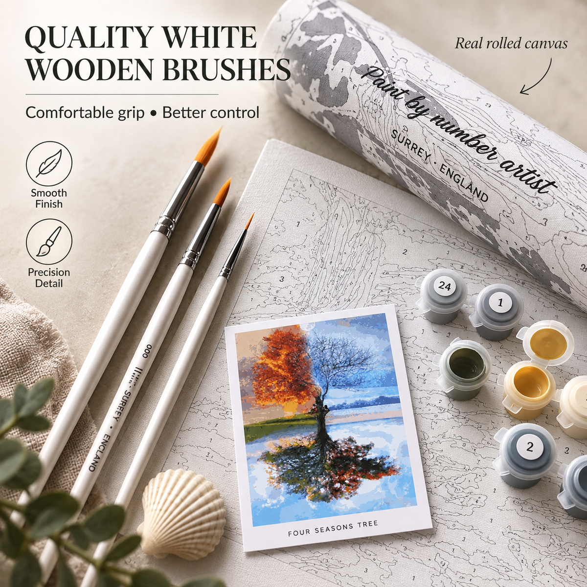 Four Seasons Tree paint by numbers kit showing quality white wooden brushes, numbered paint pots and rolled canvas packaging