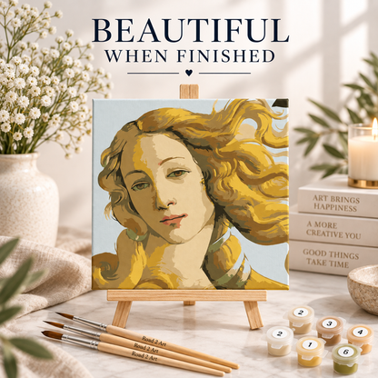 Finished Golden Venus Botticelli-inspired paint by numbers artwork displayed on a small wooden easel