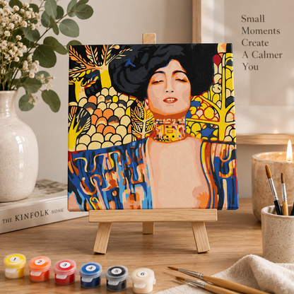Finished Gustav Klimt Judith paint by numbers artwork on tabletop easel in a calm home setting