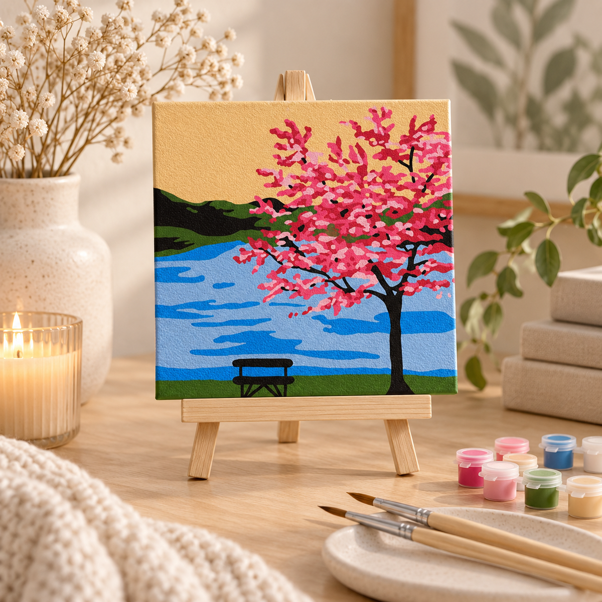 Finished Japanese blossom paint by numbers artwork displayed on the included small wooden easel