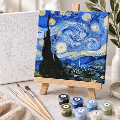 Starry Night paint by numbers kit showing numbered canvas, paint pots and natural wooden brushes
